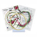 The contents of the Floral Wreath cross stitch picture kit, including fabric, needle, hoop, floss, and the pattern.