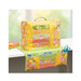 Image of sewing machine cover & caddy completed featuring a patchwork design in yellow, green, and pink hues.
