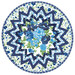 The completed Point of View Folded Star Table Topper colored in blue, light blue, green, and white fabrics from the Blueprint collection, isolated on a white background.