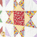 A super close up on one of the patchwork stars, demonstrating fabric prints and colors.