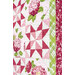 A closer look at the patchwork and borders of the quilt, showing fabric and top quilting details.