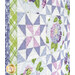 A stylized close up on the patchwork of the quilt, showing details on the pinwheel blocks and borders.