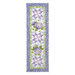 The completed Patchwork Table Runner colored in periwinkle fabrics from the Hydrangeas In The Garden collection from Riley Blake Designs, isolated on a white background.