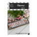 A framed cross stitch sign displaying the word FLOWERS with decorative florals and a white paneled background.
