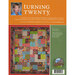 A promotional image for the quilting pattern Turning Twenty created by Tricia Crabb. The design features a colorful quilt made up of various square patches in a mix of fabrics. The top portion includes a photo of Tricia Crabb, along with details about the quilt's creation and information on how to access additional resources related to the Turning Twenty series.