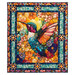The completed Flight of Beauty Panel Quilt colored in vibrant orange, teal, purple, and magenta fabrics, isolated on a white background.