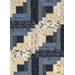 A straight on image of the quilt's log cabin patchwork design, showing the beige and navy blue colors of the quilt. 