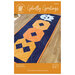 The front of the Ghostly Greetings pattern showing the finished halloween table runner. 