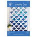 The front of the Scrappy Love pattern showing the finished quilt in blue. 