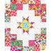 An up close image of the a patchwork star featured on the quilt, showing fabric color and detail.