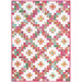 The completed Layer Cake Ladder Quilt, colored in the vibrant pink and turquoise fabrics of the Zinnias collection contrasted with white background fabric, isolated on a white background.