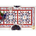 A top down shot of the table runner, showing the patchwork design, surrounded by coordinating décor.