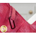 A super close up view of the loop on the inside of the bag, showing the detail and color of the lining fabric.