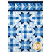 An image of the top of the quilt, showing the flying geese detail on the top, as well as fabric color and and binding details.