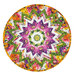 A top down shot of the completed Point of View Kaleidoscope Folded Star Table Topper, colored in vibrant magenta, yellow, orange, and green fabrics from the Dahlia Botanica collection by Wilmington Prints, isolated on a white background.