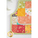 A close up shot of the pocket with lace trim on the front of the hot pad.