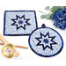 The completed Folded Hot Star Pads in dark blue, blue, and white fabrics from the Blue Belle collection by Maywood Studio, staged on a white table with coordinating decor.