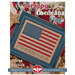 Framed cross-stitch design of a flag with 1776 America 2026, featuring red and blue colors.