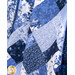 The completed Easy as ABC Quilt Kit in dark blue, blue, and white fabrics from the Blue Belle collection by Maywood Studio, draped over a chair. 