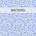 A white fabric swatch decorated with small blue leaves and florals. A banner across the top reads backing