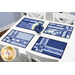 The four completed Fat Quarter Shuffle Mats, colored in dark blue, blue, and white fabrics from the Blue Belle collection by Maywood Studio, set on a white table with coordinating décor. 