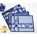 The four completed Fat Quarter Shuffle Mats, colored in dark blue, blue, and white fabrics from the Blue Belle collection by Maywood Studio, fanned out on a white table.