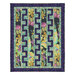 Quilt featuring a colorful floral pattern with dark zigzag accents and a purple border.