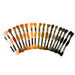 A set of 19 cross stitch floss threads in warm autumn colors, isolated on a white background.