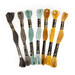 A set of seven cross stitch floss threads in brown, teal, yellow, and gold colors, isolated on a white background.
