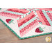 A closer look at one corner of the topper, showing details on the fabric prints and colors.