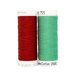 A spool of cherry red and mint green thread, isolated on a white background.