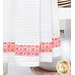 A close up on the bottom of the towel, showing details on the pink floral stripe.