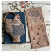 Image of the completed Henny Penny cross stitch project featuring a chicken pinkeep and a sewing roll.