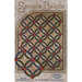 The front of the pattern, showcasing the finished quilt on a mottled background.