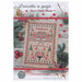 The front of the Christmas sampler pattern featuring a house, poinsettias, reindeer, and Christmas trees surrounded by coordinating holiday décor.  