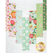 A close up on the patchwork of the quilt, demonstrating fabric colors and details on the summery prints.