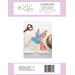 Colorful hummingbird quilt block pattern with scissors, featuring vibrant fabric pieces and floral background.