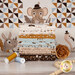 A stack of the fabrics included in the Wildly Cute Safari collection, with the included panel and a flower and wooden beads and thread.