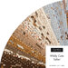 A fanned collage of fabrics from the Wildly Cute Safari collection featuring safari animals and geometric prints in hues of brown, blue, and cream.