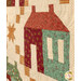 An angled super close up on one of the patchwork houses, showing print and color details on the fabrics along with top quilting effects.