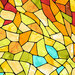 Closeup of the yellow-orange part from the ombre stained glass fabric.