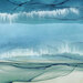 A blue and juniper fabric featuring an ocean wave motif. 