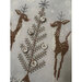 A super close up of the design showing the embellishments on the tree.