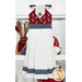The completed Hanging Towel Kit colored in red, white, and blue fabrics from the American Gatherings III collection by Moda Fabrics, hung on a drawer surrounded by coordinating patriotic décor. 