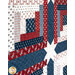 A stylized shot of the log cabin blocks and beautiful white top stitching. 