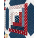 A super close up shot of the log cabin block demonstrating piecing and fabric placement. 