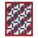 The completed Steadfast Quilt finished in patriotic themed fabrics from the American Gatherings III collection by Moda fabrics, isolated on a white background. 
