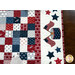 A close up shot of the appliqué and patchwork on the table runner. 