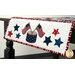 A close up shot of the appliqué on the edge of the table runner. 
