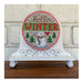 The completed Hello Winter cross stitch project, displayed on a coordinating cross stitch display stand.